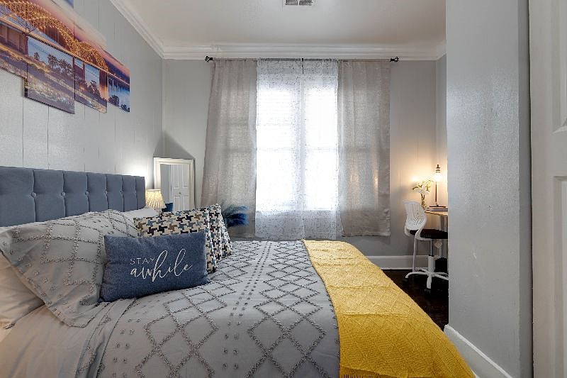 Cozy bedroom with spacious closet and dedicated workspace