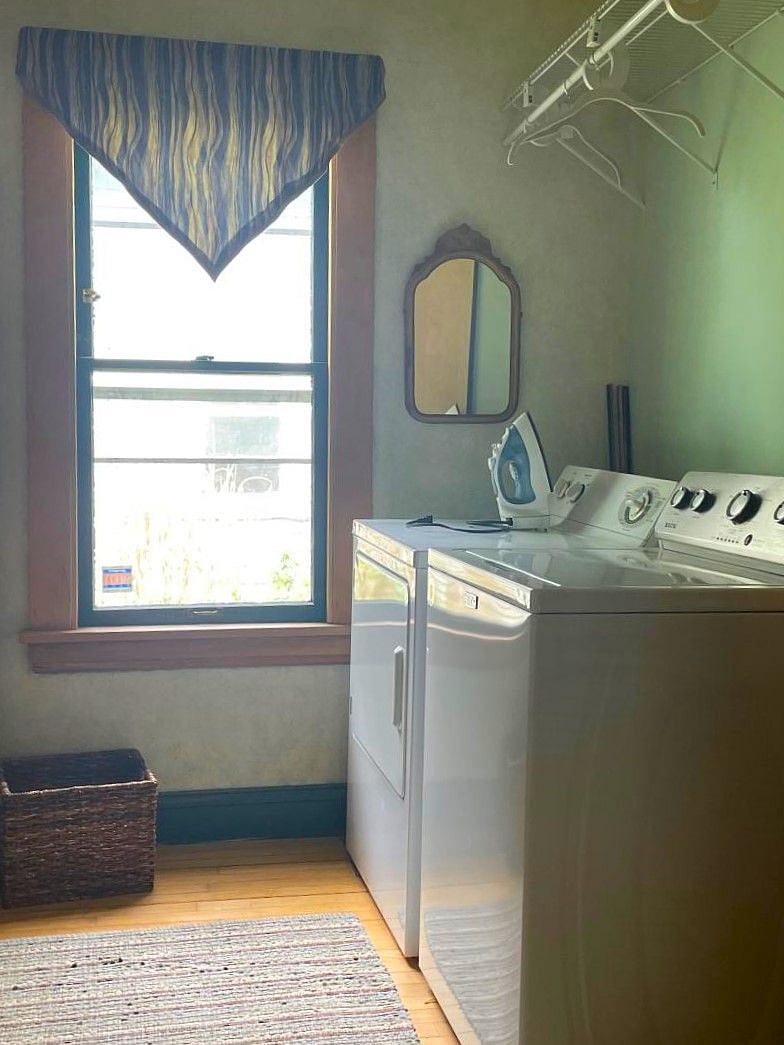 first floor laundry/office. Top load washer, gas dryer. Will leave laundry pods to get you started.