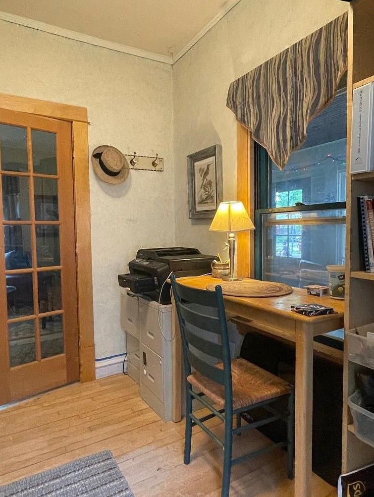 first floor laundry/office. Printer takes 8-1/2 x 11 and 11x17 paper. Will have ink and paper to start you off! View to front porch. Winter coat hooks. There is an adjustable standing desk available for your use