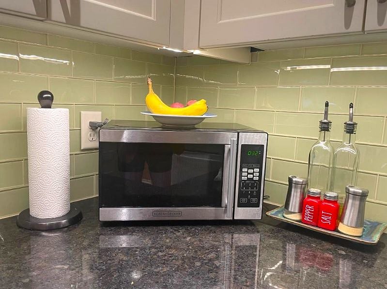 Countertop microwave, spices, oil and balsamic vinegar. Spices are in one of the upper cabinets. I will stock some paper towels to get you started. Sponges, dishtowels and rags will be under the sink or in the pantry.