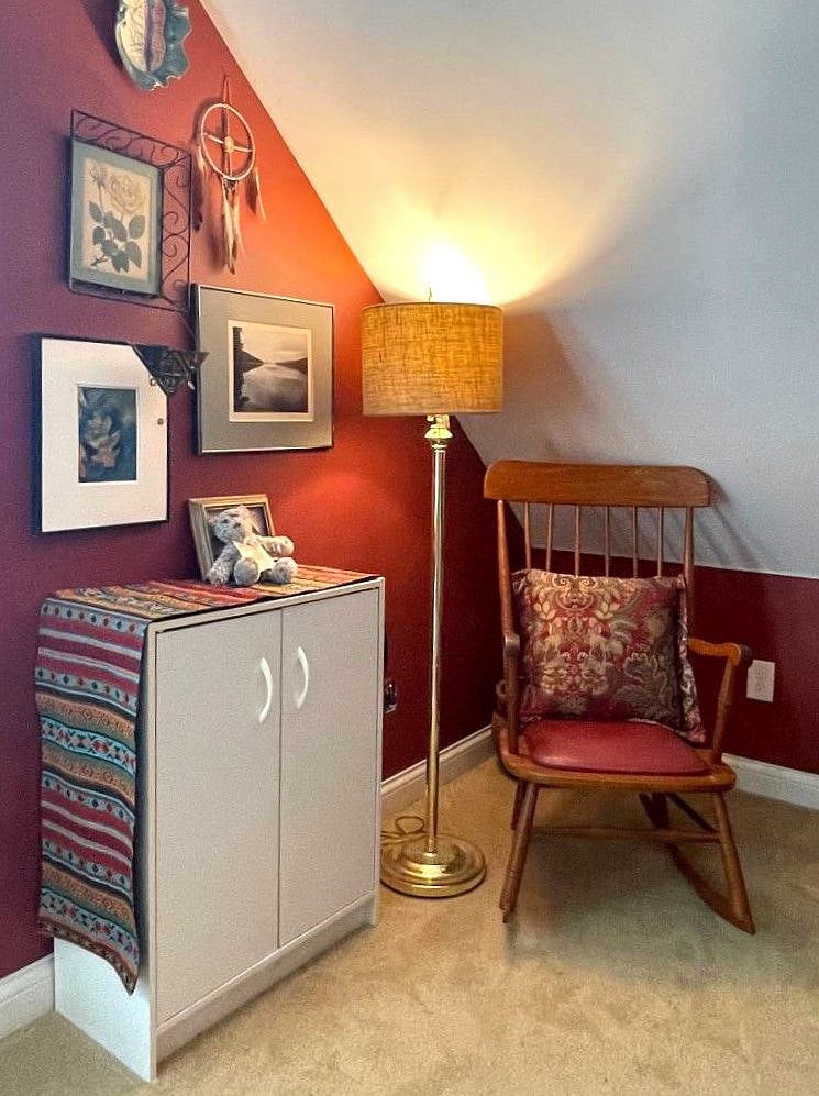 back bedroom: small bookshelf with doors for folded clothes