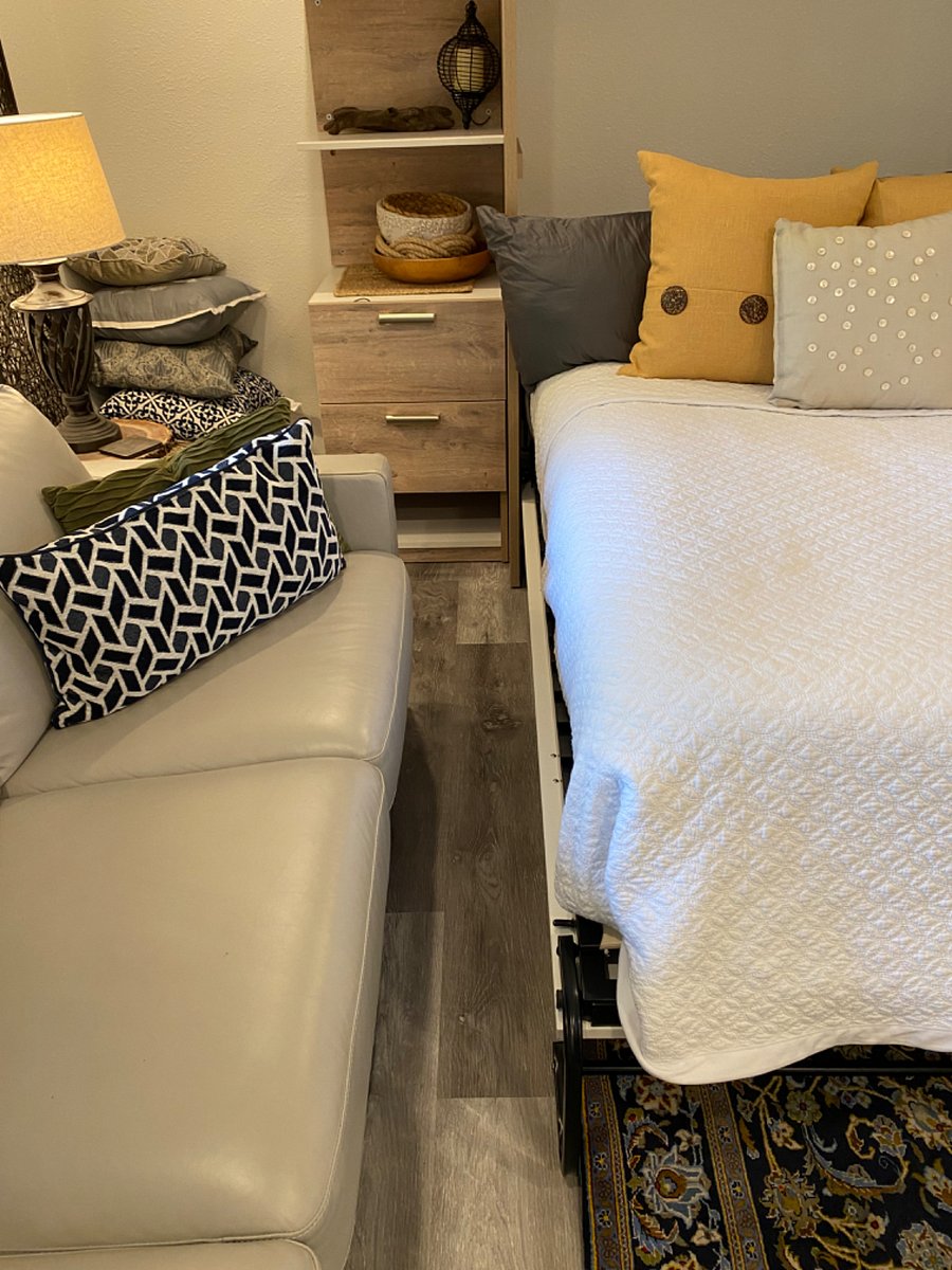 Showing space on the left side of the bed when fully extended into the living area