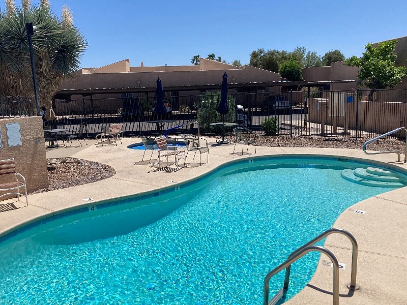 community pool and jacuzzi just down the walkway