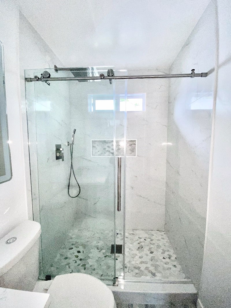 Master bath: Custom design walk in shower, mirror with light and defogger.