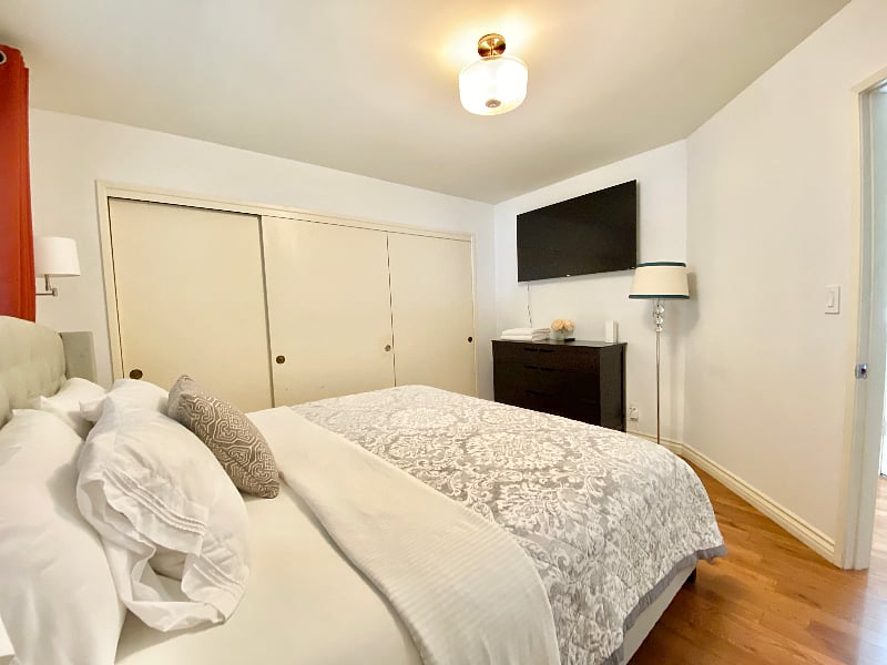 Large Bedroom #3: Queen bed, 55" TV, dresser, large closet.