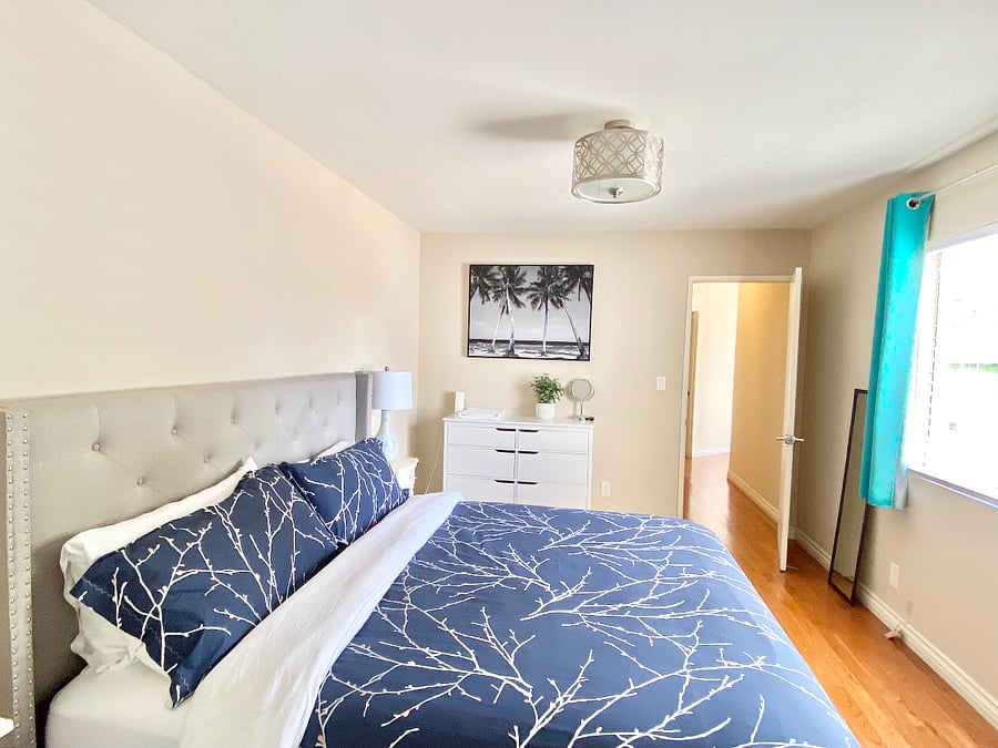 Large Bedroom #4, King bed, Near bath #3 and exit door #3.
