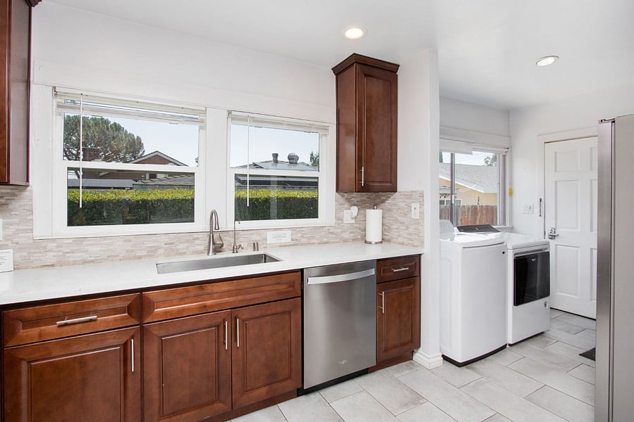 Large kitchen with clothes washer, dryer, refrigerator, dishwasher included. Side entry door.