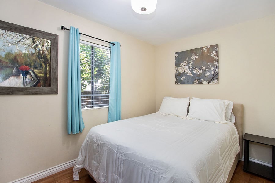 Bedroom #2, Queen bed, dresser, 55" TV.