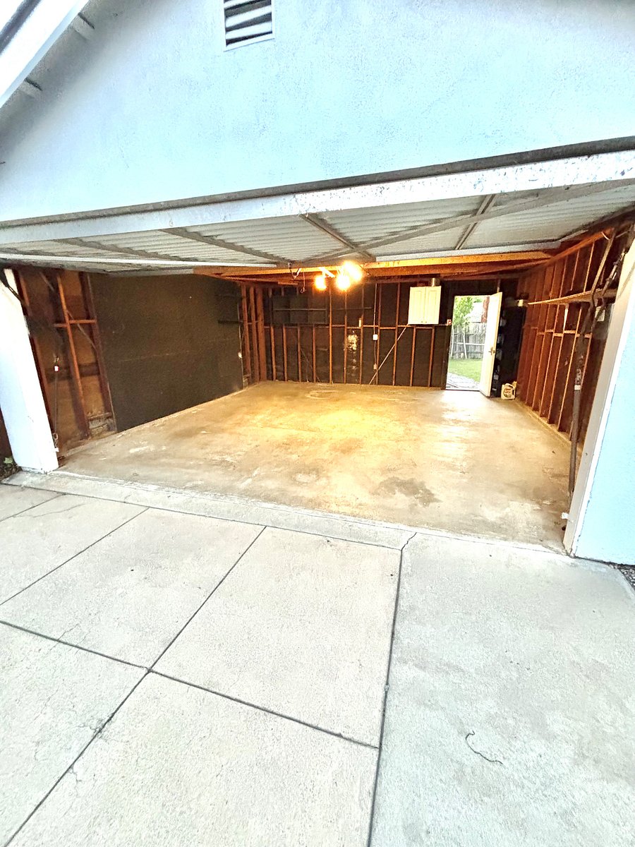 Spacious 2 Car Garage with new quiet motor and 2 remote clickers.