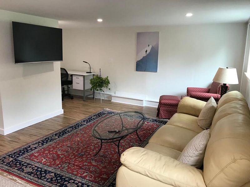 first floor tv room with office space