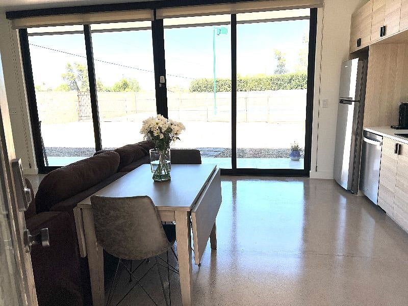 Kitchen area with expandable dropleaf table.  