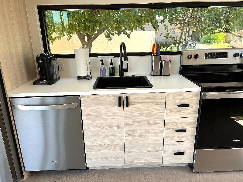 Full size appliances and garbage disposal. 