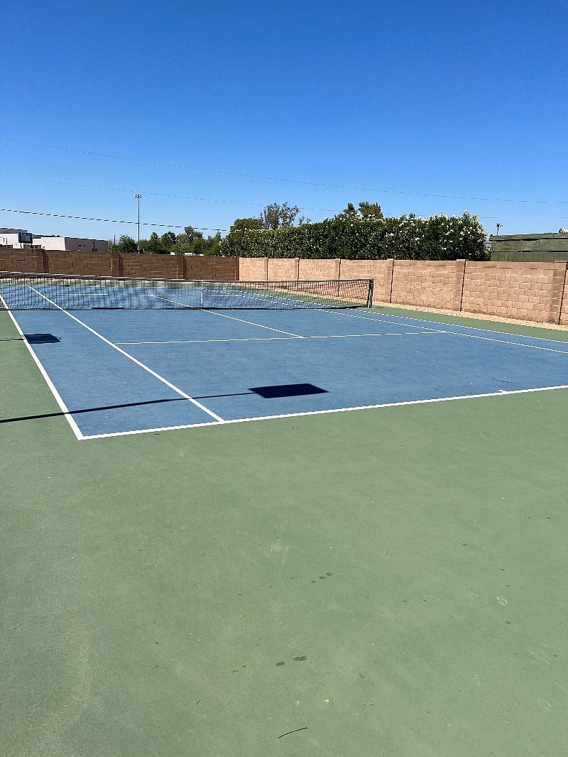 Tennis court in backyard
