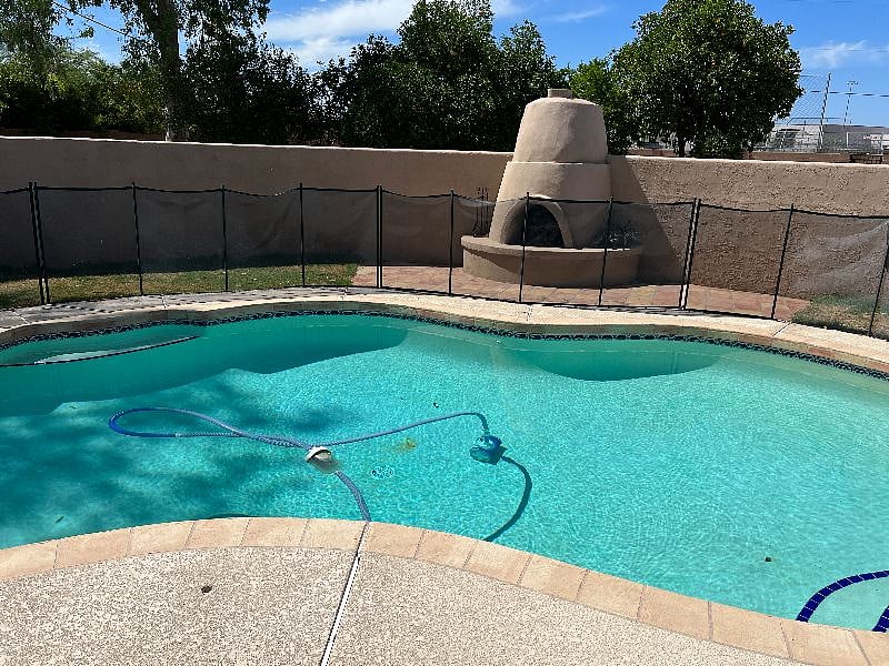 Swimming pool in backyard