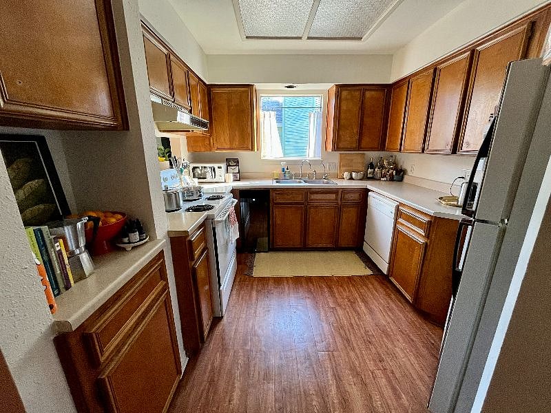 Fully stocked kitchen with dishwasher, microwave, stove, etc.