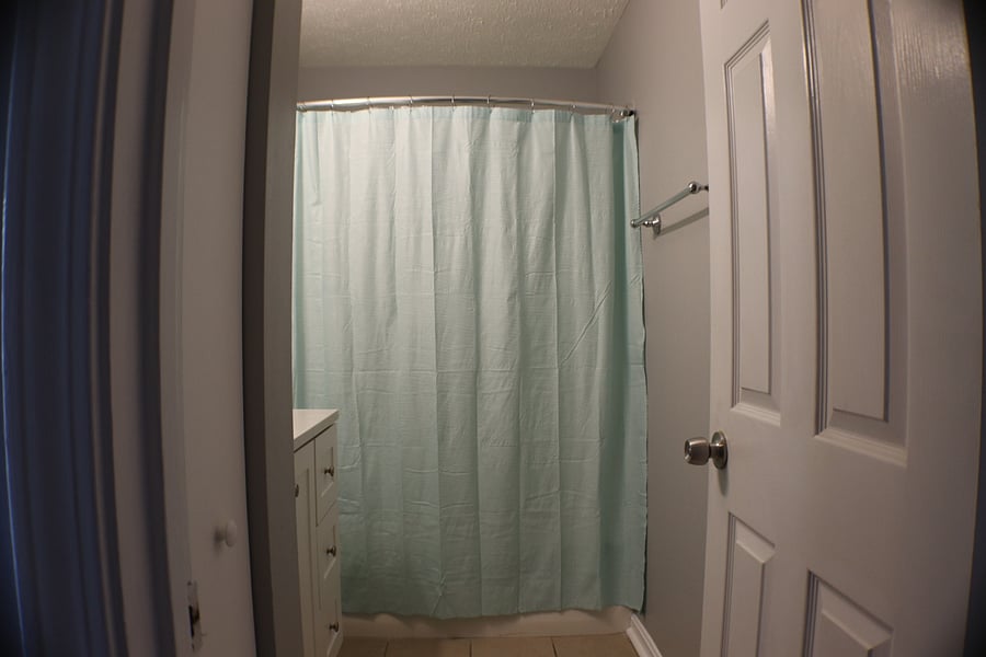 Bathroom with shower/tub combo.