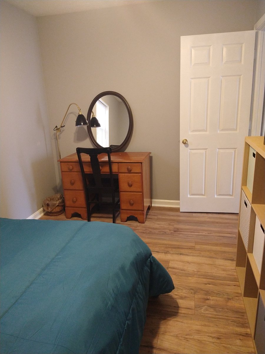 Secondary bedroom/office with desk.