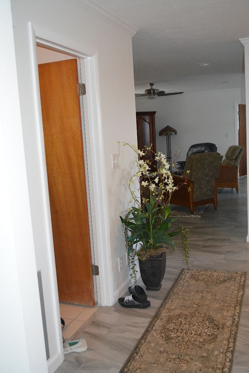 Laundry room entrance looking into the living room.