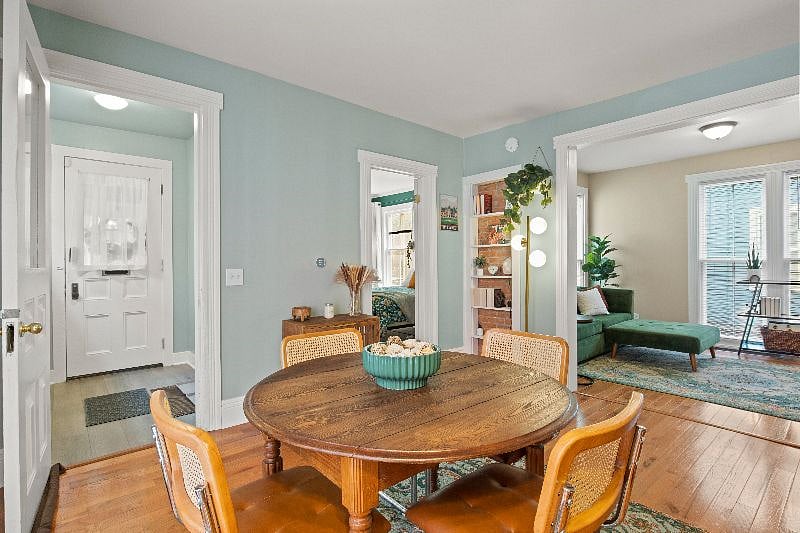 View of bedroom and living room from dining room