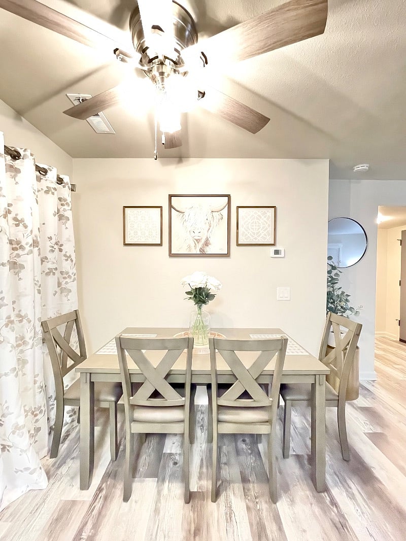 Your beautiful dining table that sits 4 as configured, but has a bench if you slide it out, and and you can seat 2 more people.