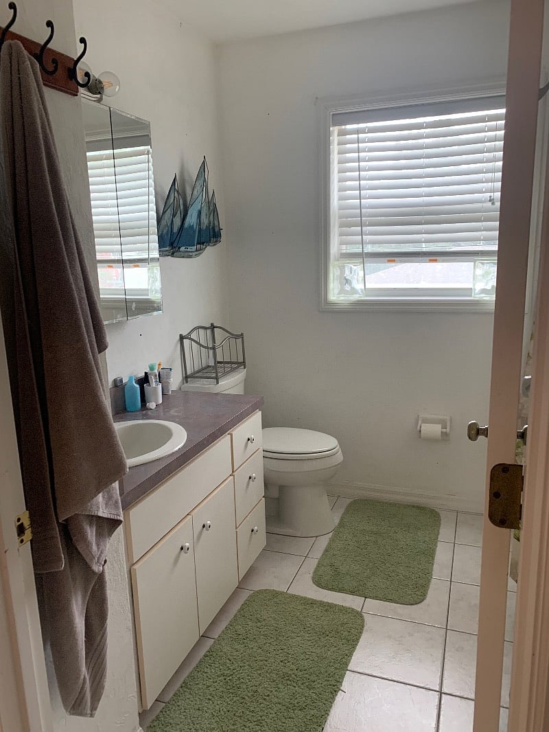 Smaller bathroom with a tub and shower