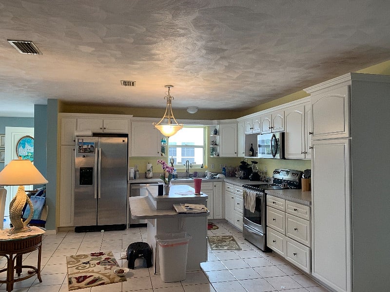 Open kitchen with delux appliances , , ice maker, brand new dishwasher, garbage disposal, microwave, 5 burner stove with regular and convection oven