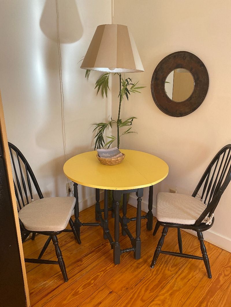 Cozy corner with table and chairs.