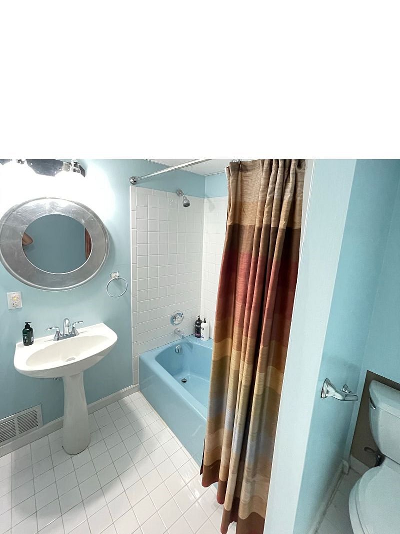 Full updated bath with shower over tub.
