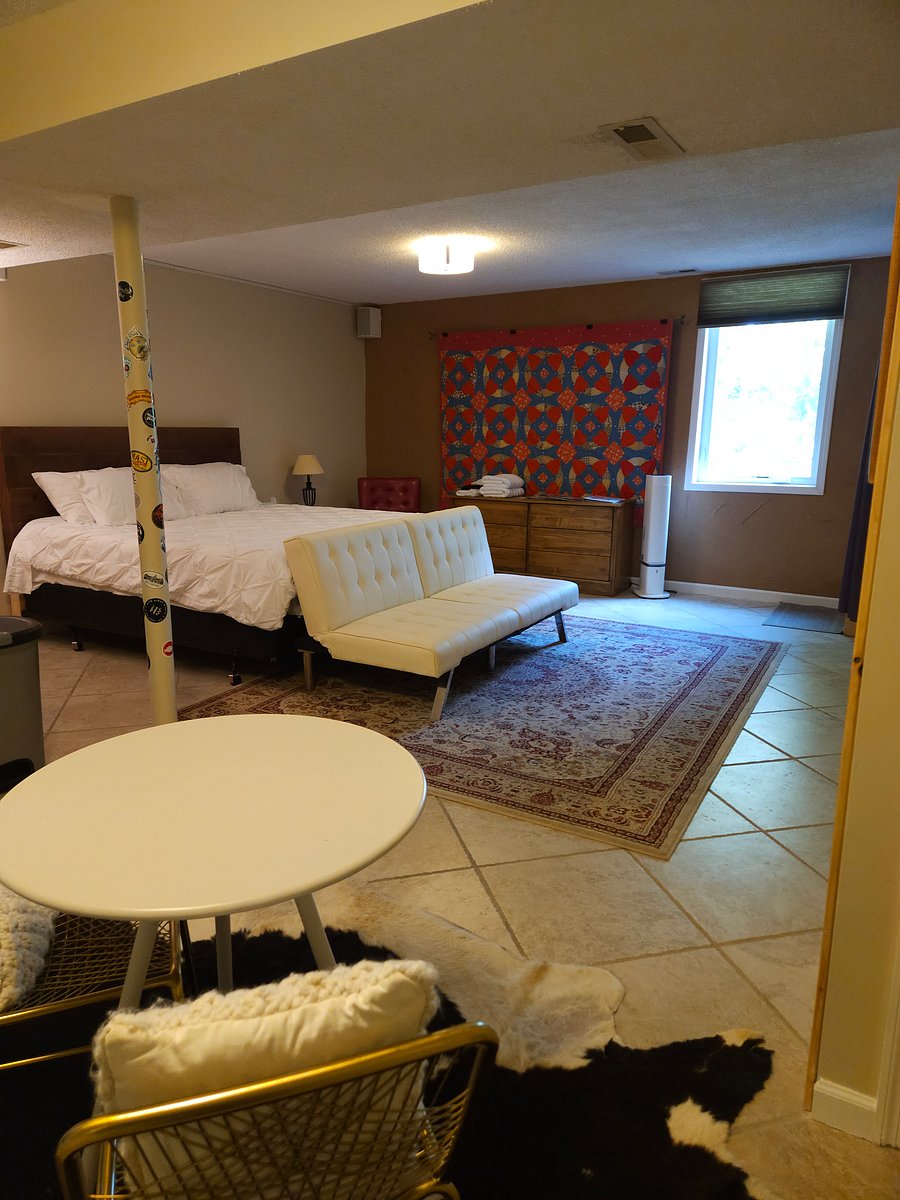 ample room for fold-out futon in front of king bed