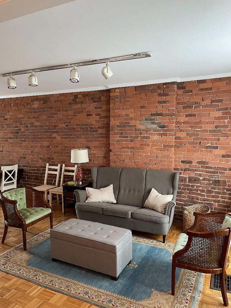 We love exposed brick walls.