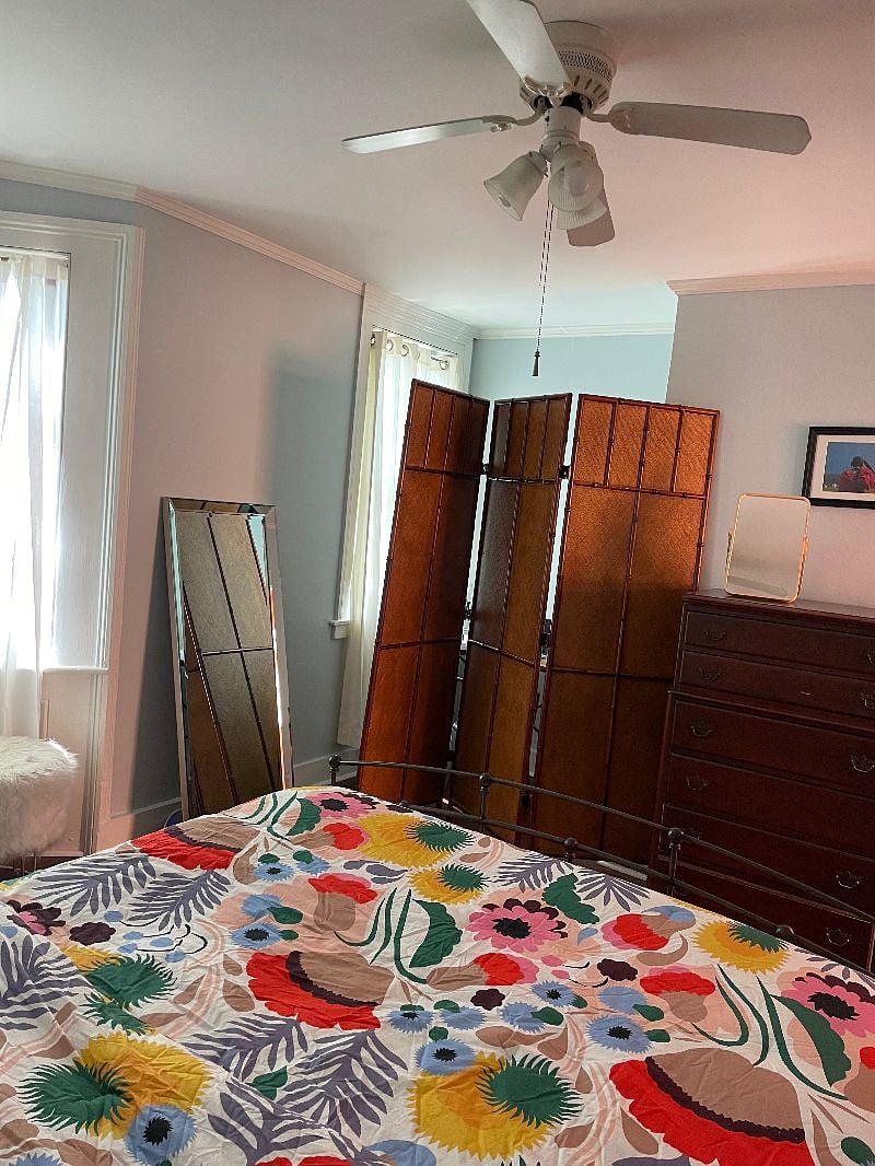 Behind the antique divider is a little work space.