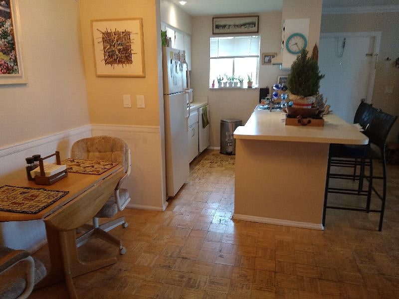 Kitchen, coffee maker, microwave, toaster oven and blender.