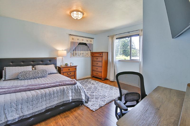 Bedroom #2 with queen bed and quality furnishings!  Flat screen smart TV and work from home ready!