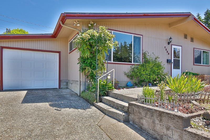 Private garage with remote door opener.   Security flood lights all around property.