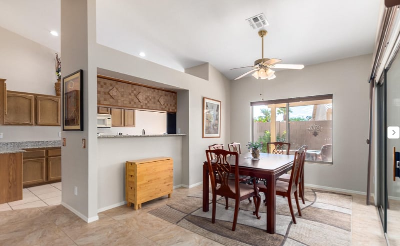 Dining room with sliding door to outdoor covered patio.  Seating for six.