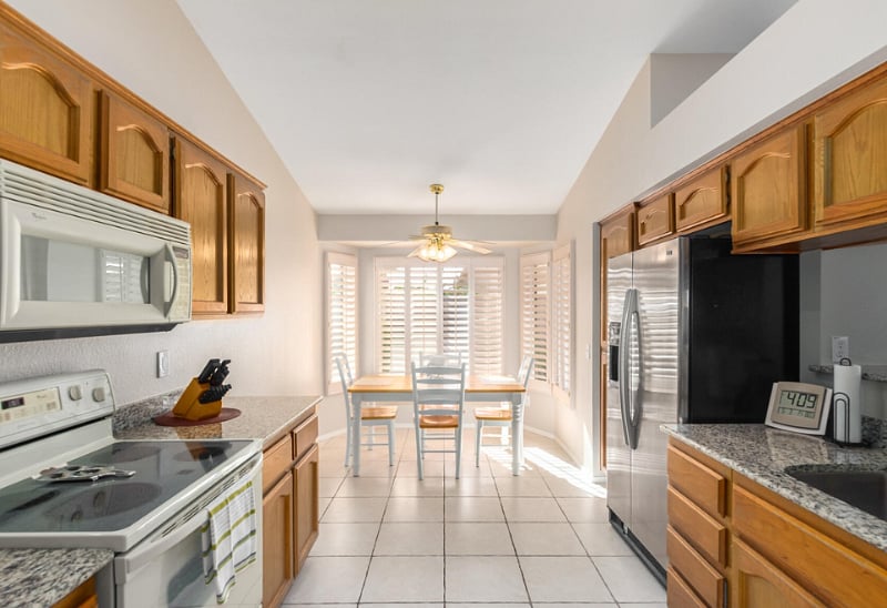 Kitchen includes cookware, drinkware, plates, bowls and utensils.  Appliances - microwave, electric oven/stove, dishwasher, refrigerator and Keurig coffee maker. 