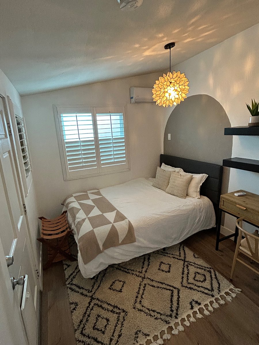 Queen bed with shutter windows