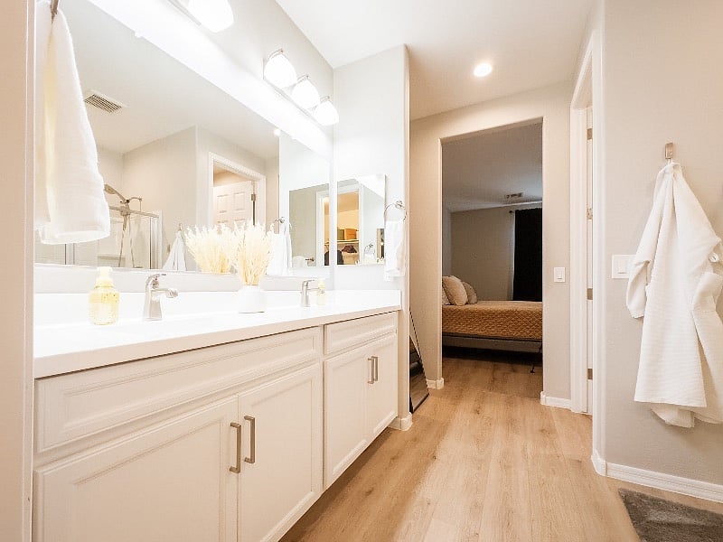Bedroom #4, Owners Suite Bathroom: Double Sink Vanity, Shower, and Toilet 