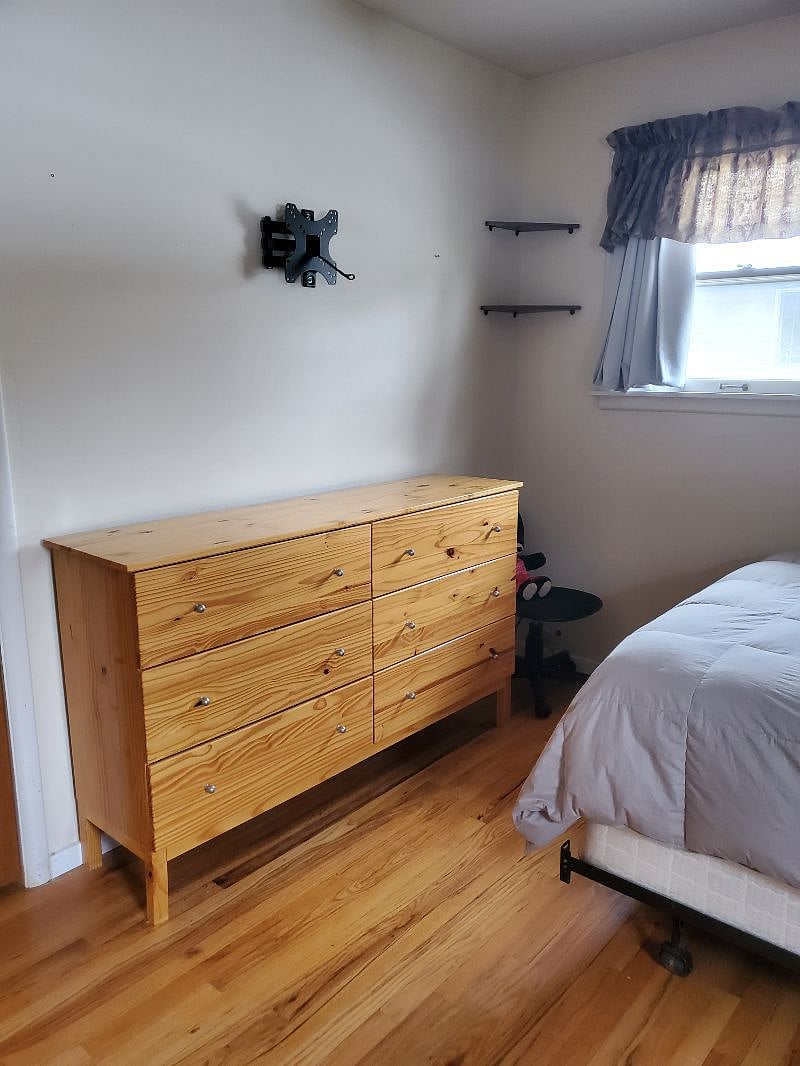 Ample space in the bureau in your room
There is a new Smart TV on the wall above.