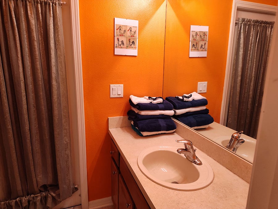 Bathroom with entryway visible.