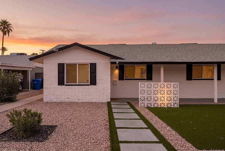 Landscaped front yard with private entrance