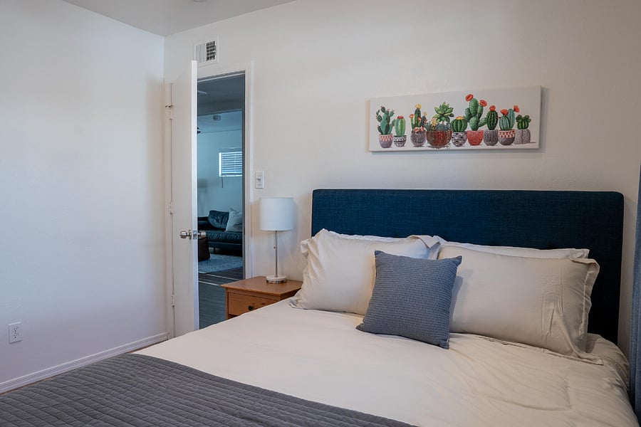 Secondary bedroom with nightstand