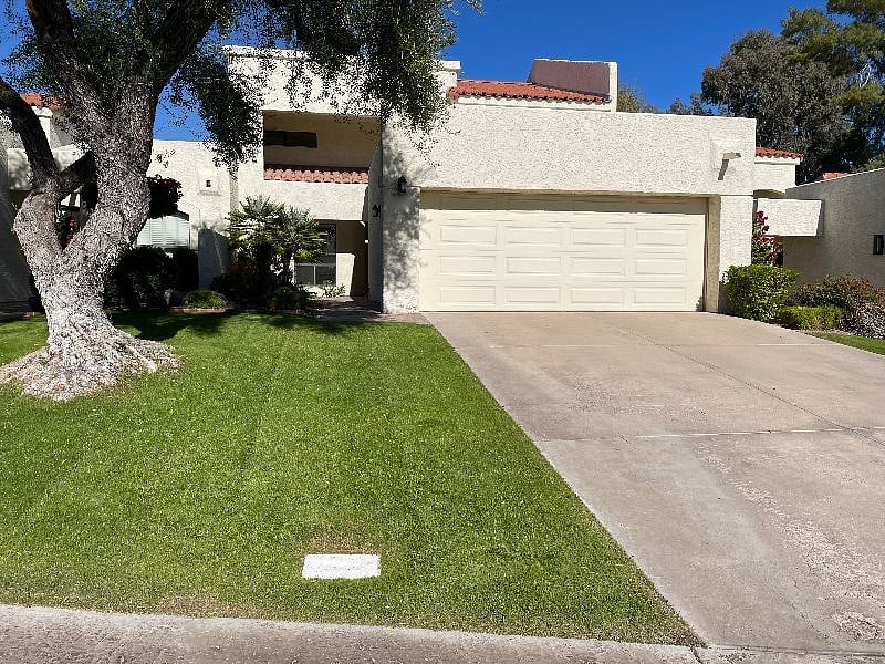 Front of Townhome with connected 2 car garage