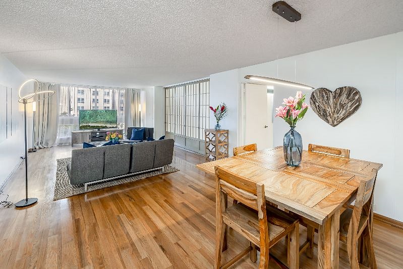 Living room and dining room with Large HD smart TV