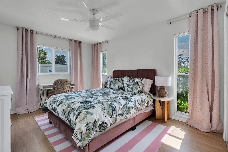 Queen guest bedroom with a 55" TV, and a private desk!