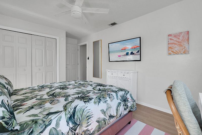 Queen guest bedroom with a 55" TV, and a private desk!