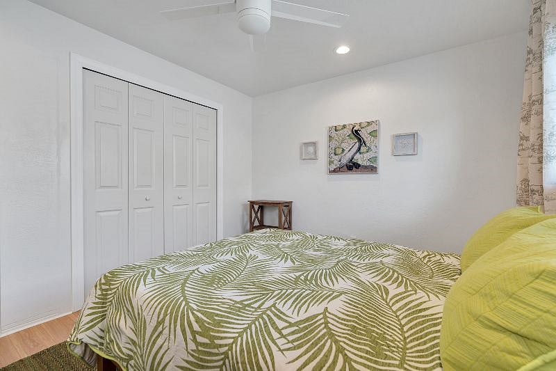 Queen guest bedroom with a large bureau in closet!