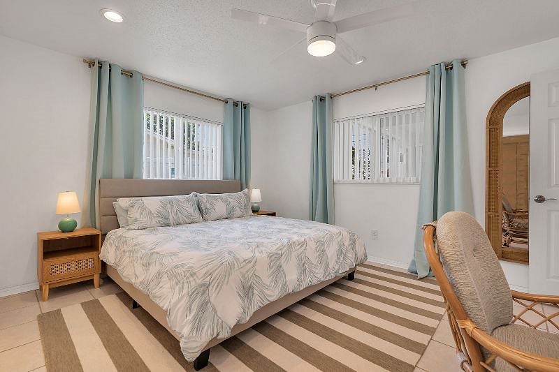 King Bedroom! With a desk and 55" TV, and a huge walk-in closet! Also has a pack n play, and private bathroom.