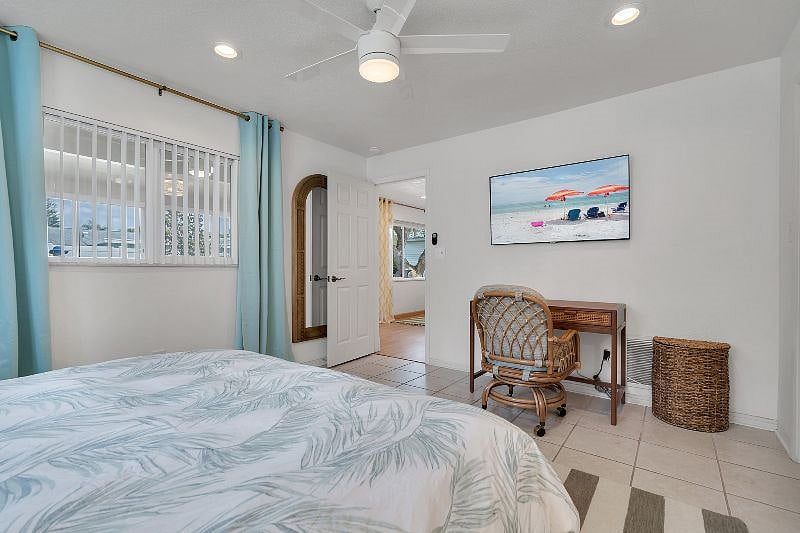 King Bedroom! With a desk and 55" TV, and a huge walk-in closet! Also has a pack n play, and private bathroom.
