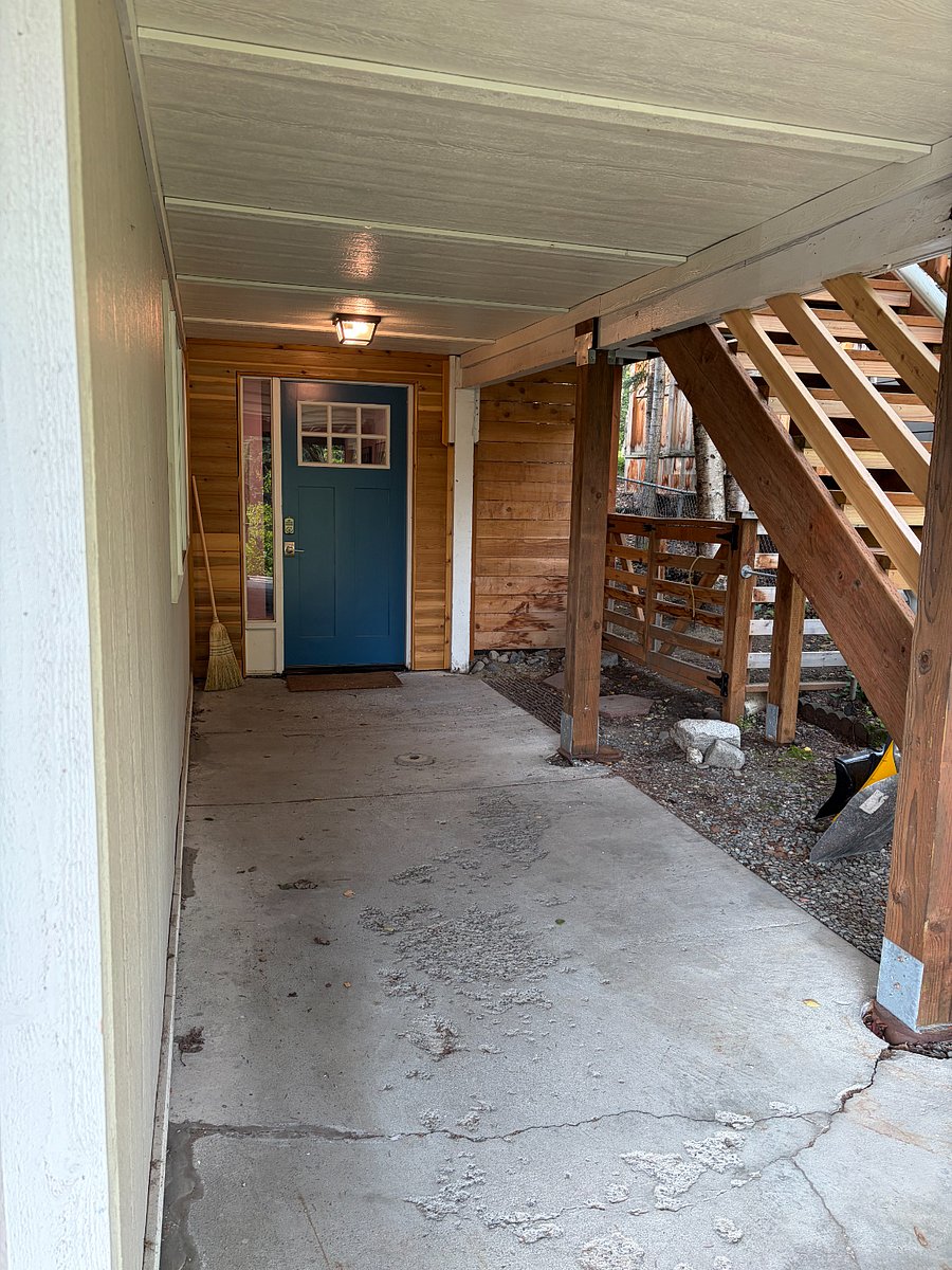 Your entrance is through the blue door.